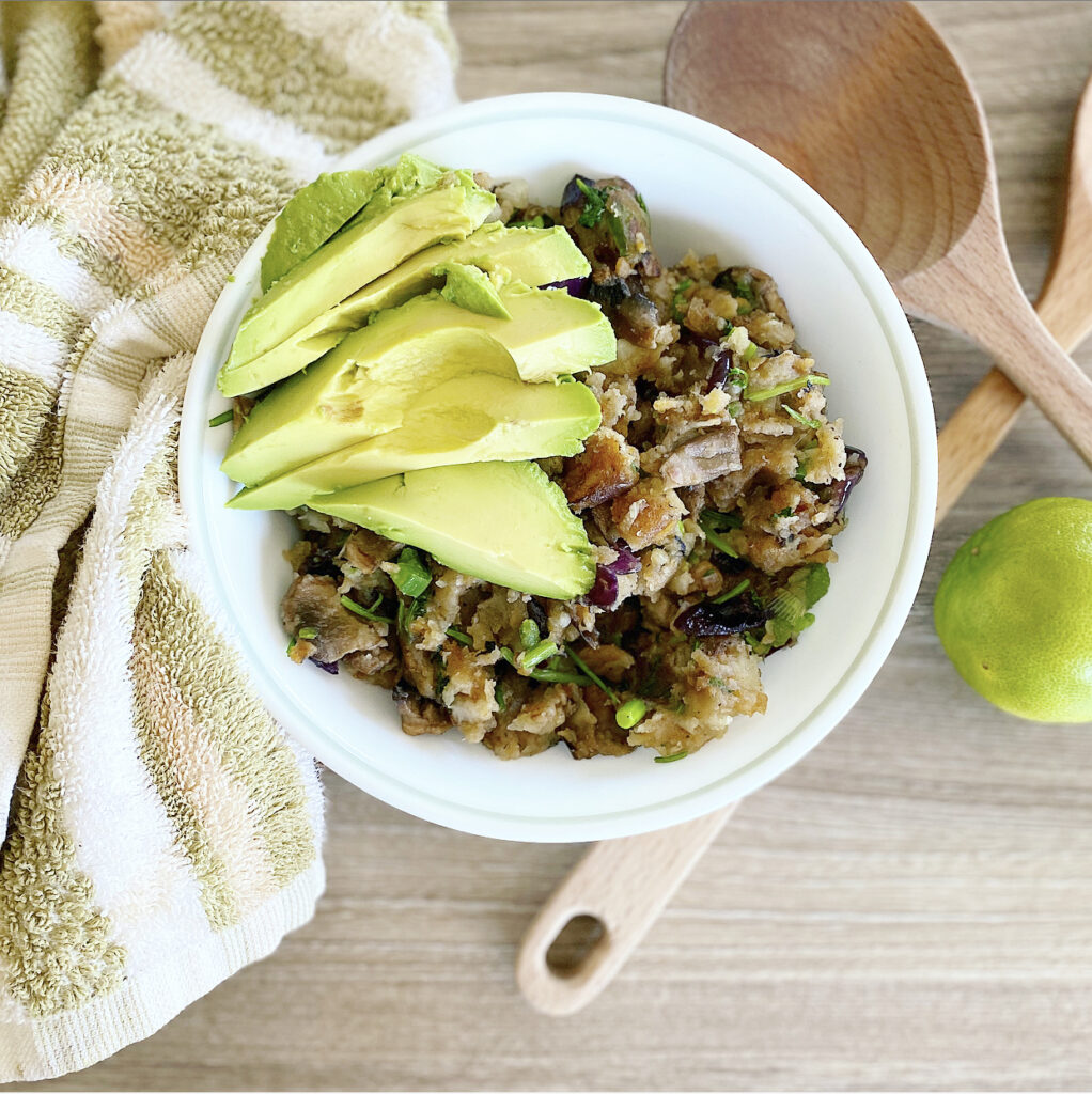 A skillet full of delicious vegan breakfast hash with potatoes and vegetables.